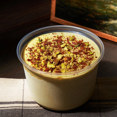 Nonna Lia pistachio semifreddo – creamy Italian-style frozen dessert made with real pistachios and dusted with cocoa, traditional and indulgent.